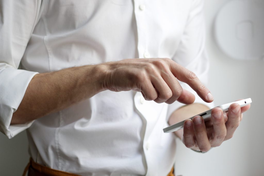 Man using a mobile phone.