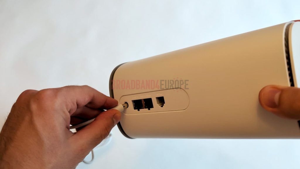 Plugging in the Vodafone GigaCube.
