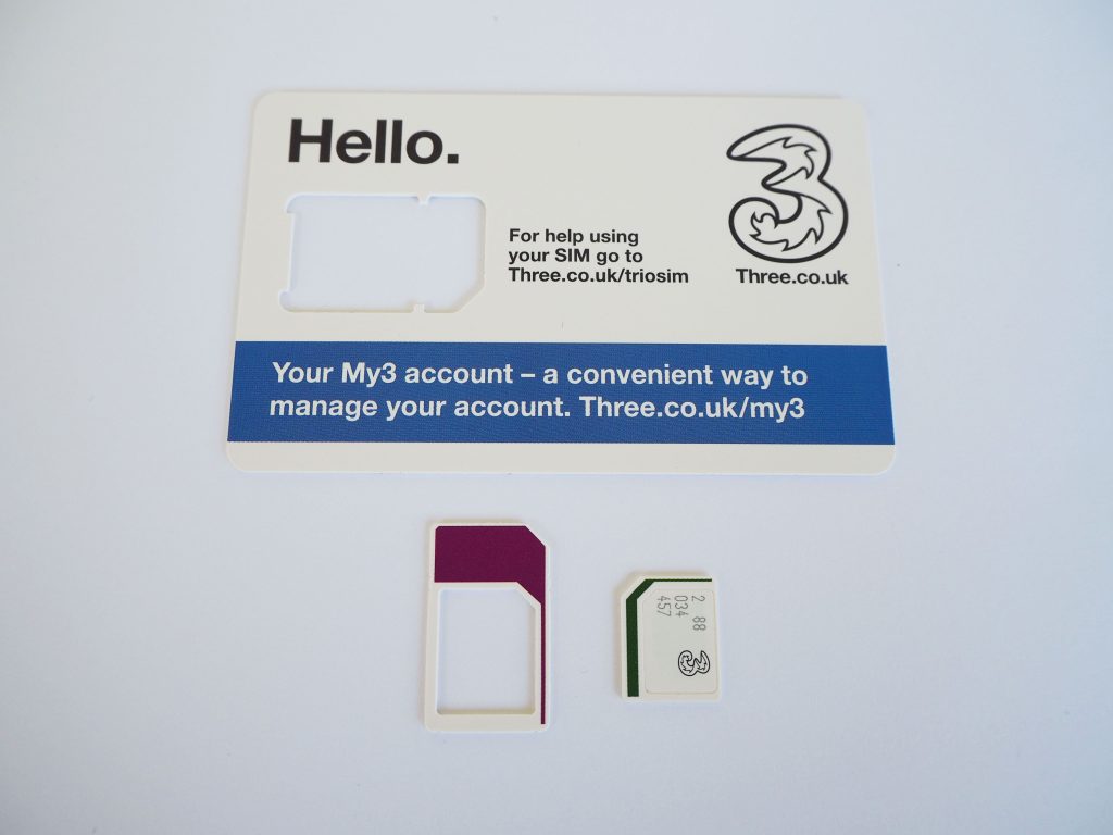 Tre SIM cards.
