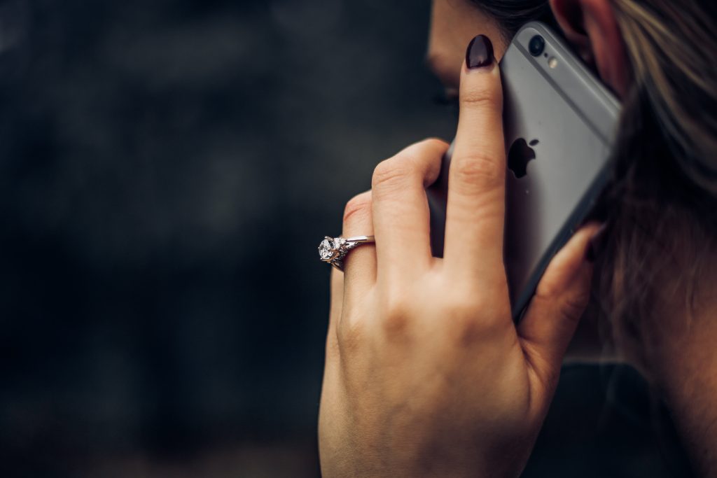 Woman phoning her broadband provider.